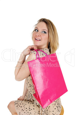 Happy woman with shopping bag.
