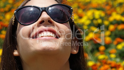 Teen Girl With Sunglasses And Flowers