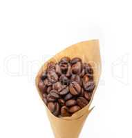 espresso coffee beans on a paper cone