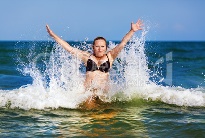 Woman in bikini in the sea