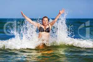 Woman in bikini in the sea