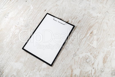 Clipboard with blank paper