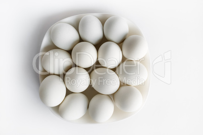 White eggs on a plate