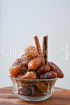 Glass bowl full of dates