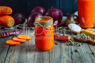 Two jars of fresh carrot juice