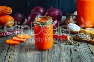Two jars of fresh carrot juice