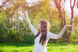 happy woman in spring forest