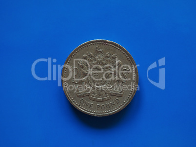 One Pound (GBP) coin, United Kingdom (UK) over blue