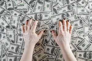 Female hands and money