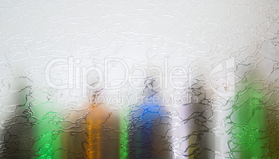 Blurred defocused bottles abstract background.