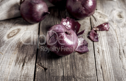 Red onions in the husk, macro