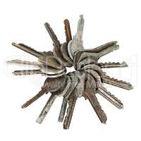 bunch of old door keys isolated on white background