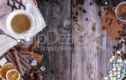 Grey wooden background with black coffee