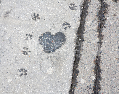 Heart on sidewalk - wet spot on the sidewalk