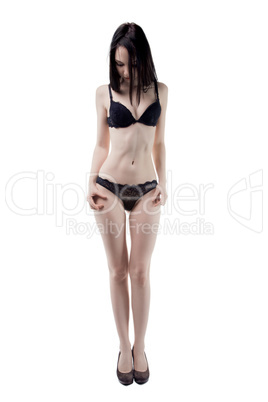 Shy young woman in lingerie