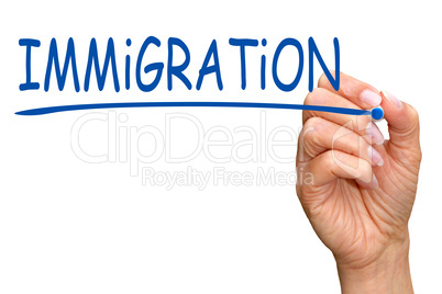 Immigration - female hand writing text