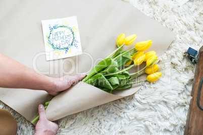 Man packing bouquet