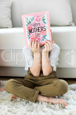 Boy with happy mothers day card