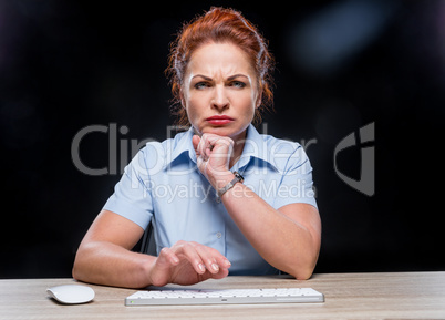 Angry woman with keyboard