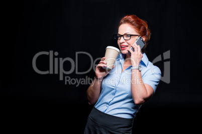 Businesswoman talking on smartphone