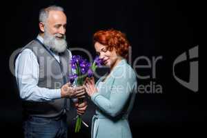 Mature couple with flowers