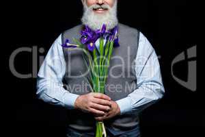 Senior man with flowers