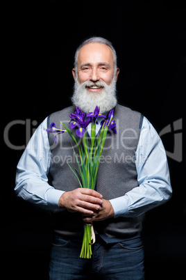 Senior man with flowers