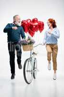 Mature couple with bicycle