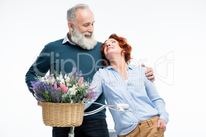 Mature couple with bicycle