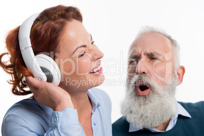 Mature couple with headphones