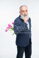 Senior man with tulips