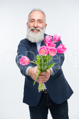 Senior man with tulips