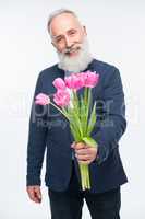 Senior man with tulips