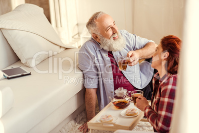 Mature couple drinking tea