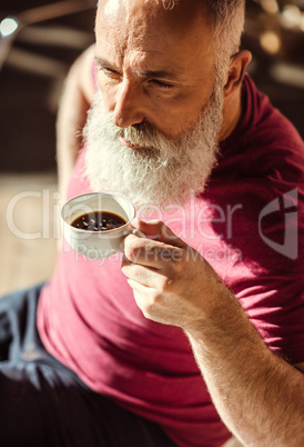 Man holding coffee cup