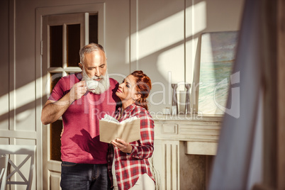 Mature couple reading book