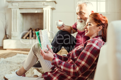 Mature couple reading book