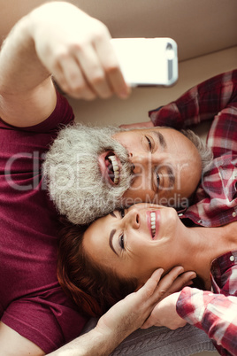 Mature couple taking selfie