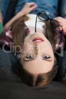top view portrait of stylish woman with eyeglasses looking to camera