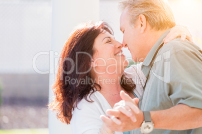 Middle Aged Couple Enjoy A Romantic Slow Dance Outside