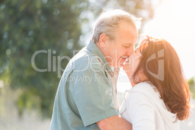 Middle Aged Couple Enjoy A Romantic Slow Dance and Kiss Outside