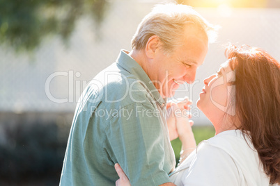 Middle Aged Couple Enjoy A Romantic Slow Dance Outside