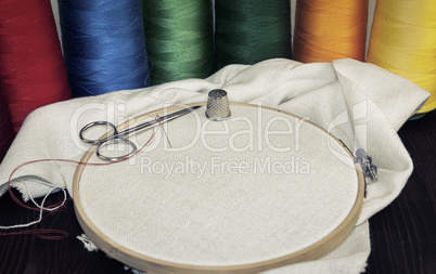 Round wooden hoop with a white cloth
