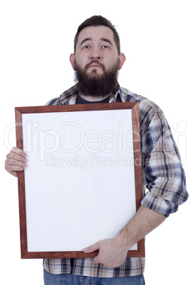 Bearded man in a plaid shirt holds a board for records