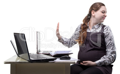 Lazy blond pregnant woman at work