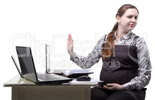 Frowned pregnant woman at work