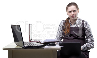 Frowned pregnant woman and laptop