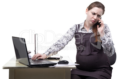 Pregnant woman talking on the smart phone