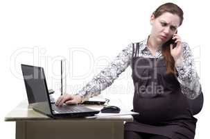 Pregnant woman talking on the smart phone