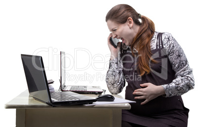 Angry pregnant woman talking on the smartphone
